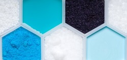 Chemical ingredient in hexagonal molecular shaped container. Urea, Shampoo Liquid, Potassium Permanganate, Polyethylene, Copper (II) Sulfate, Sodium Hydroxide Pellets and Hair Conditioner.