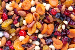 Dried fruits with nuts. Cashew, hazelnuts, peanuts, dried apricots, viburnum, raisins.