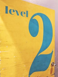 Yellow door with number 2