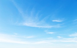 blue sky with puffy clouds background