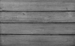 Rustic natural weathered teak wood textured with dark paint for retro and vintage background design	