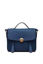 Women's dark blue leather bag in vintage style, with a flap top, handle, gold lock, front view. The trendy purse for office, business trips or casual occasions isolated against the white background.
