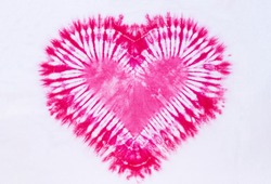 heart sign tie dye pattern on cotton fabric background.