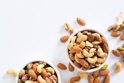 mixed nuts in white ceramic bowl 