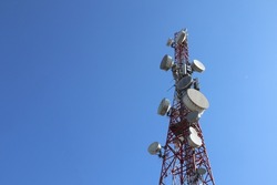 Base Transceiver Station or BTS or BTS Tower is a telecommunications infrastructure that facilitates wireless communication between communication devices and the operator's network. on blue sky
