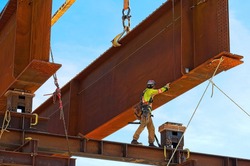 Steel girder and two meter web installed  on a bridge abutment and scaffolding as part of a new interchange in southern Saskatchewan Canada for a new freeway system and extension of the Trans-Canada