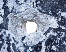 hole in the concrete, the conceptual background