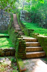 Sigiriya ( Lion's rock ) is a large stone and ancient palace ruin in the central  Sri Lanka ( Ceylon ). steps and the ruins of the royal palace and the park of Sigiriya