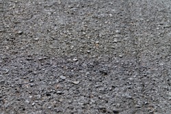 Asphalt close-up for background, texture of asphalt