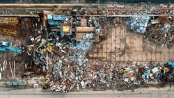 Many containers for collecting scrap metal, collecting metal for secondary raw materials. Metal waste for recycling. Ferrous scrap, non-ferrous scrap. Import and export of scrap. View from above