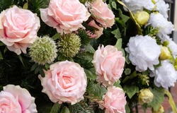 Artificial flowers in pastel colors. A bunch of artificial flowers. Ever-blooming bouquet.