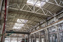 An abandoned steel frame structure automobile production workshop