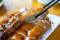 A delicious and tempting Cantonese-style roasted braised, deep well roasted goose