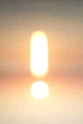  Blurred photo,The reflection of sunset over the sea, turned upside down - looks like an exclamation point !