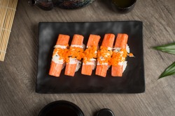 Crab sticks Sushi Japanese Food Style, Crab sticks Sushi roll on the table.