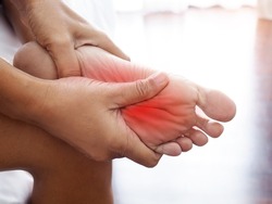 people suffering from foot pain foot injury. Health problems and illness concept.