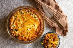 Salty pie or quiche made with Craterellus lutescens or Cantharellus lutescens or Cantharellus xanthopus or Cantharellus aurora, commonly known as Yellow Foot, is a species of mushroom.