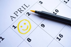 The date of April 1 is circled on the calendar close up. April Fool's Day