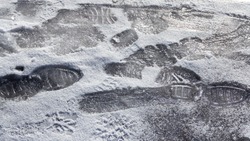 Footwear traces on icy surface