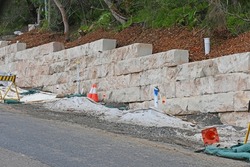 Construction of large sandstone block wall
