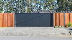 Automatic wooden sliding gate and wooden fence