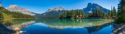 Emerald Lake panorama view in summer sunny day. Michael Peak, Wapta Mountain, and Mount Burgess in the background. Yoho National Park, Canadian Rockies, British Columbia, Canada.