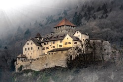 Majestic castle on the mountainside. Castle fortress on hill. Beautiful castle fortress. Medieval castle fortress on hill