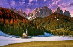 Church near the forest at the foot of the mountains. Mountain church in valley. Church in mountain valley. Mountain forest church landscape