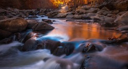 Rock Creek Pool - This long exposure image of the pool inside Rock Creek Park captures the autumn colors of orange and yellow.  It is located between Silver Spring MD and Washington DC