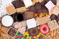 Food containing sugar. Too much sugar in diet causes obesity, diabetes and other health problems