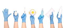 Health protection equipment such as gloves, masks and sanitizers held in hands, isolated on white background