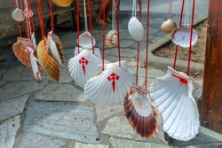 Scallop Shell, symbol of Camino de Santiago Walking path in Europe. Famous Camino de Santiago walking road and street. Pilgrims ways. The Way of Saint James pilgrimage