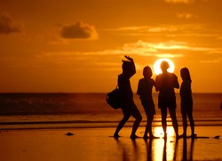 family photo shilouette  of sunset at Parangtritis beach