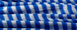 The bottom is knitted with white and blue stripes. Russian telnyashka. It is an iconic uniform worn by the Russian Navy, Airborne Forces and the Marines.