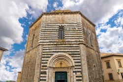 The Baptistery of San Giovanni an octagonal thirteenth-century religious building standing just in front of the Duomo of Volterra in the Tuscan hill town.