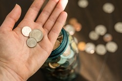 Jar of Coins, Finance, Pinching Pennies, Saving Money, Woman Holding Coins, Woman Saving Money, Copy Space