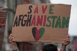 SAVE AFGHANISTAN placard at a STOP KILLING AFGHANS protest in London