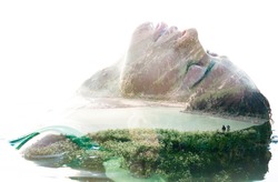 Double exposure portrait of attractive woman combined with photograph of lake surrounded by mountains