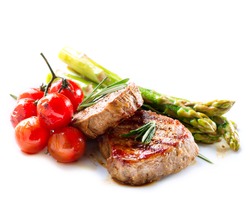 BBQ Steak. Barbecue Grilled Beef Steak Meat with Vegetables. Healthy Food. Barbeque Steak Dinner