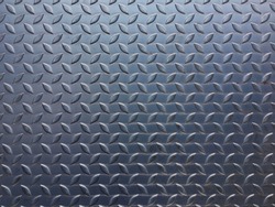 Top view of Iron plates background on street.