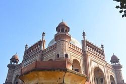Safdarjung tomb, the last monumental tomb garden of the Mughals, was planned and built like an enclosed garden tomb in line with the style of the Humayun Tomb. It is a sandstone and marble mausoleum.