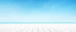 Sea beach background with white wood panel floor foreground. Landscape cloud blue sky summer.