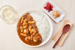 Japanese Seafood Curry
(Squid, shrimp, and scallop in spicy yellow curry served with steamed rice.
