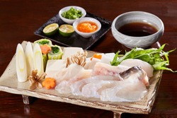 An assortment of ingredients for fugu nabe (blowfish hot pot),  Tecchiri nabe set