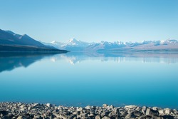 Beautiful Lake Pukaki with Mt Cook reflected in its bright turquoise waters