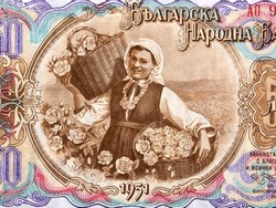 Peasant woman with baskets of roses from Bulgarian money