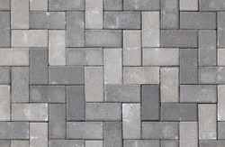 Seamless texture of street tiles. Pattern of gray sidewalk tiles