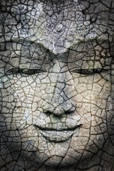 Rough stone Buddha face