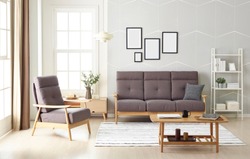 Scandinavian style livingroom with fabric sofa, sofa table. 