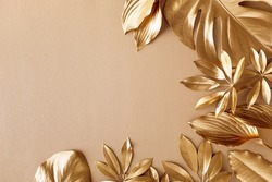 Golden leaves fashion floral minimal concept. Stylish natural background for design and decoration top view.